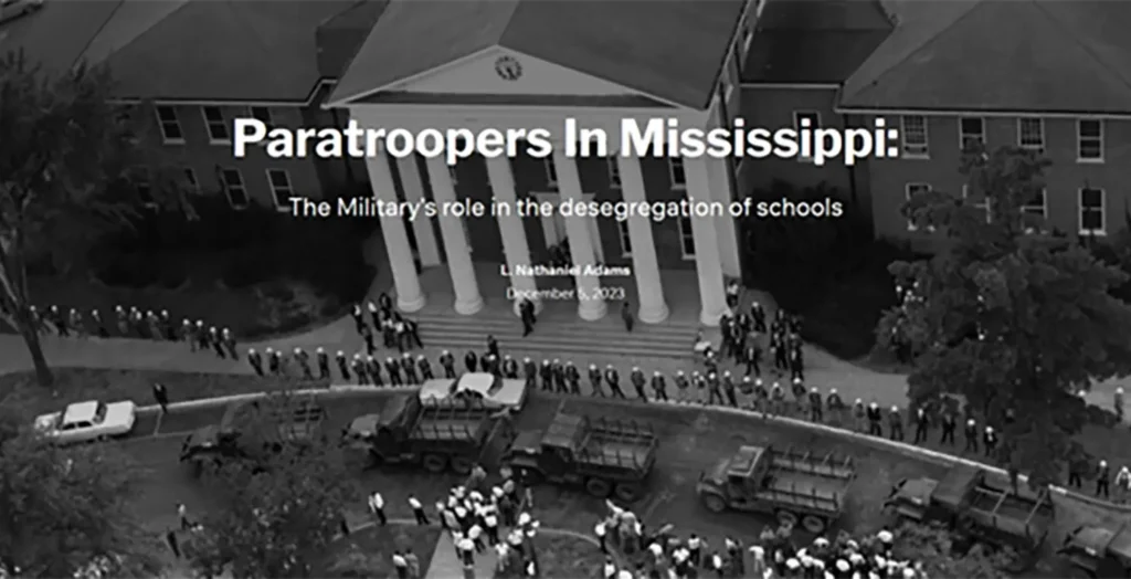 Picture of troops in front of Old Miss during desegregation 